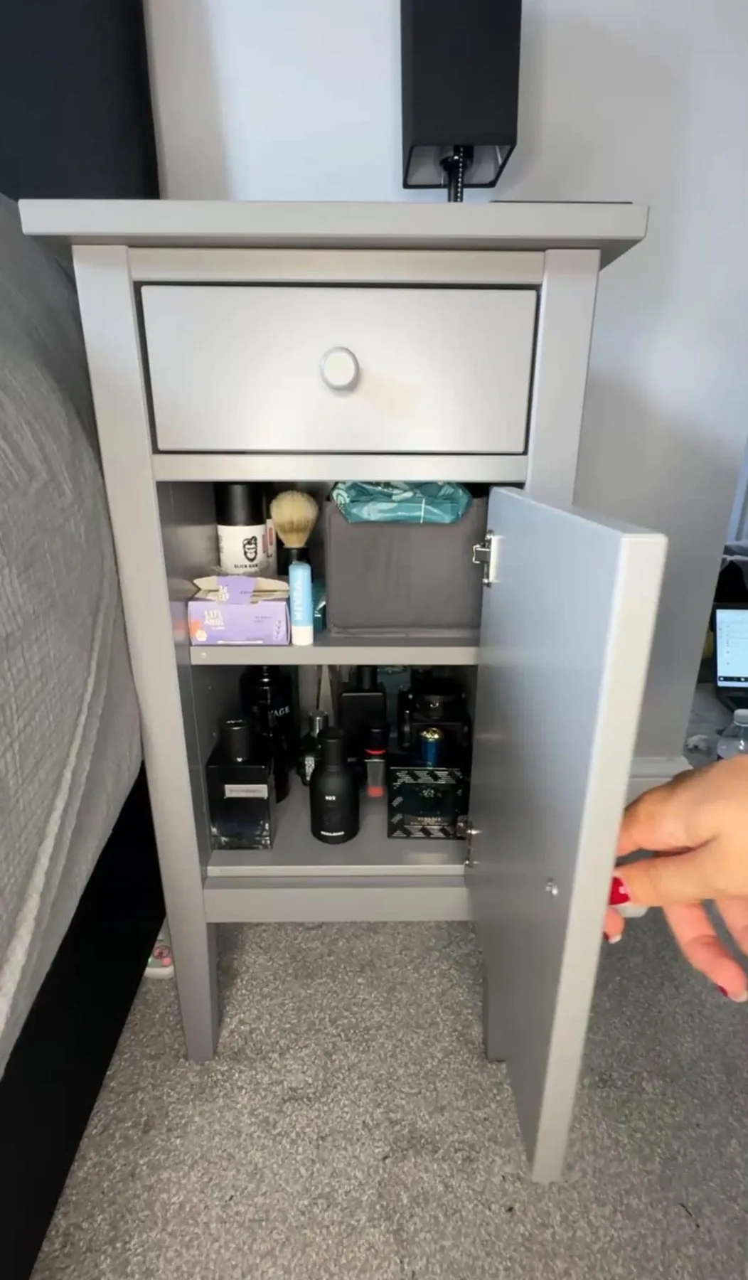 Organised bedside cupboard