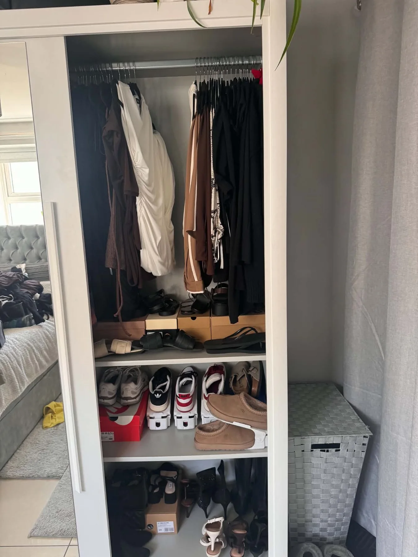 Wardrobe after decluttering and organisation